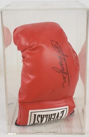 *AUTOGRAPHED EVERLAST BOXING GLOVE: Signed by Joe Frazier, enclosed in plexiglass case.