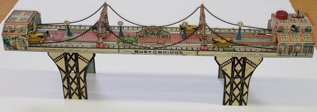 MARX BUSY BRIDGE TIN WIND-UP: Approximate length 24".