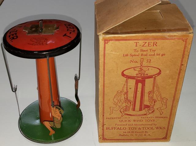 BUFFALO TOYS T-ZER TIN WHIRL-AROUND: Approximate height 5 3/4", with original box.