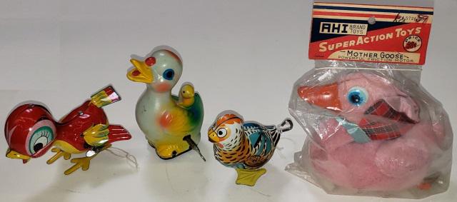 4 WIND-UP TOYS: 2 tin, red bird marked "Mikuni, made in Japan", and small bird marked "J. Chein", 1 plastic duck, and 1 Mother Goose HAI Toys friction toy with packaging.