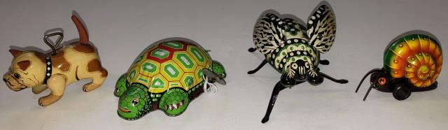 4 TIN TOYS: 3 wind-up, dog, turtle, and beetle, and 1 friction toy snail by Lehmann.