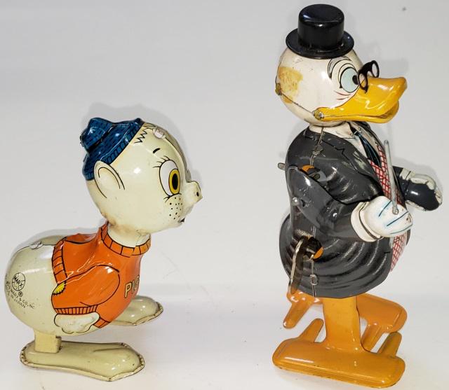 2 MARX TIN WIND-UP TOYS: Donald Duck and Piggy.