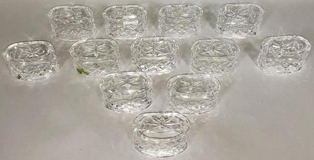 *SET OF 12 WATERFORD CRYSTAL NAPKIN RING HOLDERS: Napkin ring holders.