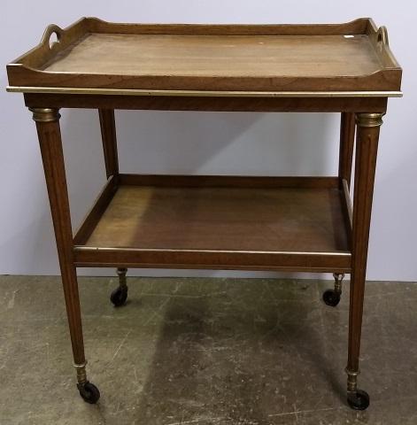*SHERATON STYLE SERVING CART: By Baker, having tray style top over pull-out slides, circular tapering legs joined with platform stretcher.