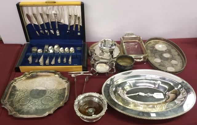 *GROUP OF SILVERPLATE: Flatware, candle holder, wine coaster, bread plate, tray, meat platter, etc.