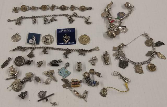 *GROUP OF BRACELETS AND CHARMS: 5 silver chain bracelets with charms, and 38 separate charms.