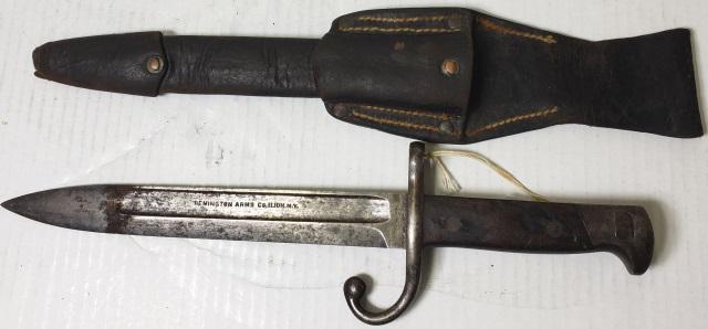 *REMINGTON BAYONET: With sheath, marked "Remington Arms Co. Ilion, N.Y.", approximate length 12 3/4".