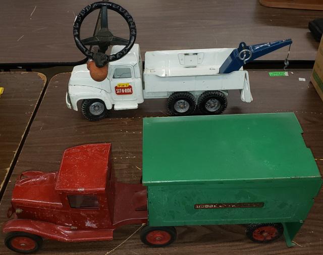 2 BUDDY L TOY TRUCKS: Express Line red cab with green box, approximate length 24", and Sit-n-Ride white tow truck.