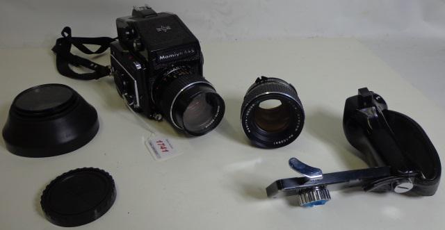 *MAMIYA 645 SINGLE-LENS REFLEX CAMERA: Mamiya 645 Model 1000S, (S/N: L25146), eye-level finder attached, 55mm F2.8 Mamiya Sekor lens, (S/N: 28067), 80mm F1.9, (S/N: 103641), side-grip, 50mm UV filter.