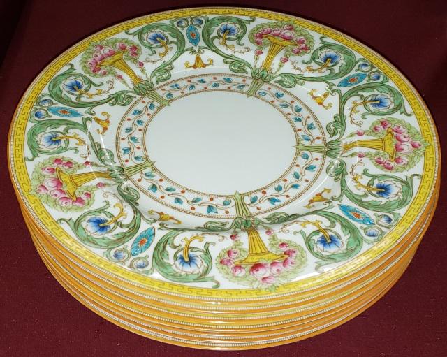 *7 ROYAL WORCESTER SERVICE PLATES: Decorated with cornucopia and scrollwork, approximate diameter 10 1/2".