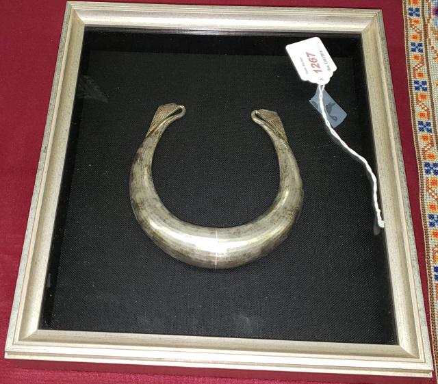 *SILVERED METAL AMULET: Enclosed in shadow box.