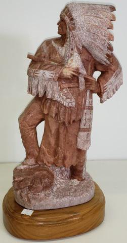 *TIM WASHBURN ALABASTER SCULPTURE: Indian chief with peace pipe, signed on back, on revolving wooden base, approximate total height 17 3/4".