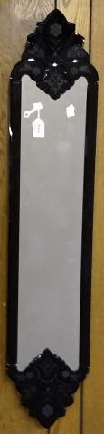 VENETIAN GLASS WALL MIRROR: Having ebony and etched floral decoration.
