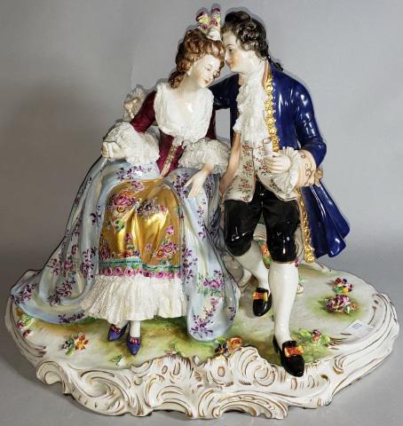 *CAPODIMONTE PORCELAIN FIGURAL GROUP: Depicting man and woman toasting, approximate height 10 7/8", width 13 1/2", depth 9".