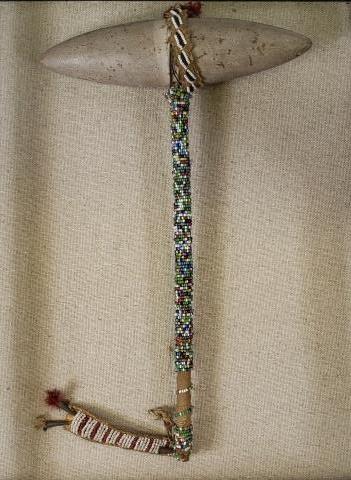 *NATIVE AMERICAN WAR CLUB: With beaded handle, housed in shadow box, shadow box approximately 15" x 12".