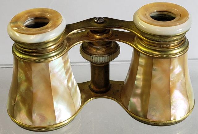 *PAIR OF OPERA GLASSES: Mother of pearl-clad opera glasses.