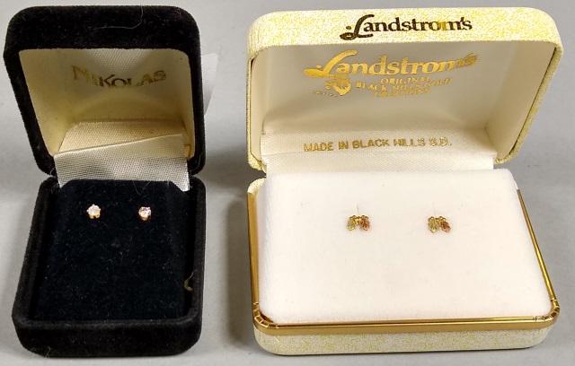 *2 PAIRS OF STUD EARRINGS: Pair with 14K gold posts inset with diamonds, and pair from Black Hills Gold.