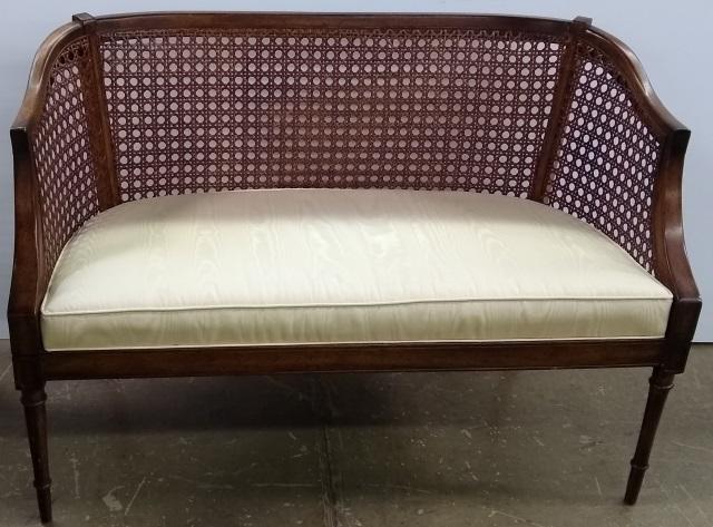 *SHERATON STYLE SETTEE: Having cane back and sides.