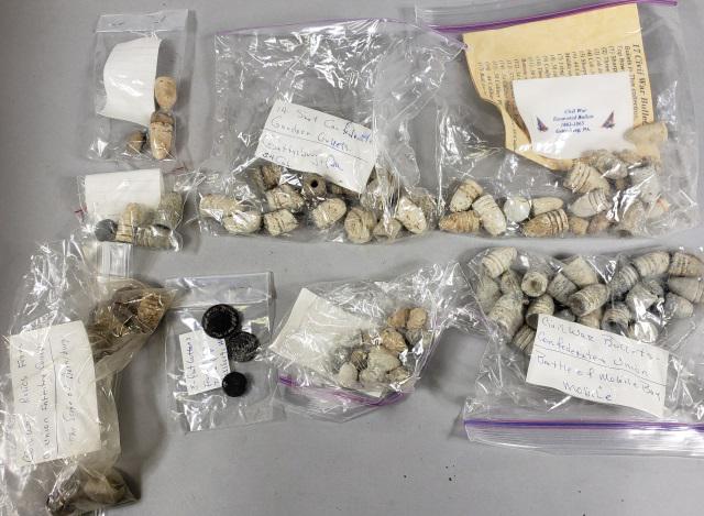 GROUP OF CIVIL WAR RELICS: US Cavalry bullets from General Grant's headquarters during the Siege of St. Petersburg, Union buttons from trash pit in Vicksburg, Mississippi, Confederate bullets and .54 caliber Civil War pistol bu