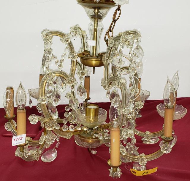 PERIOD STYLE CHANDELIER: Fitted with 8 branches and decorated with glass pendants.