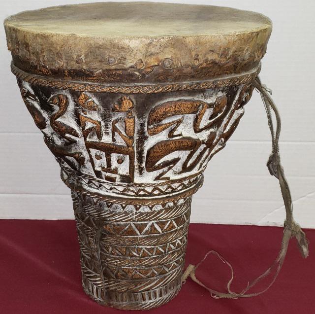 PRIMITIVE DRUM: Carved with native dancers.