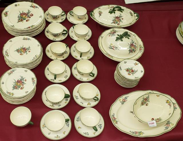 SET OF VILLEROY & BOCH DINNERWARE: Having floral decoration, 10 dinner plates, 8 salad plates, 10 bread plates, 13 cups, 12 saucers, 10 berry bowls, 2 covered bowls, oval platter, and oval open bowl.