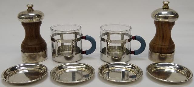 *8 PIECES OF STERLING SILVER: 2 mugs by Alessi having glass inserts, 4 nut dishes, and 2 shakers.