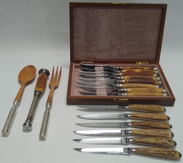 *17-PIECE SET: Salad fork, knife, 14 matching steak knives, and mortar, all sterling-clad.