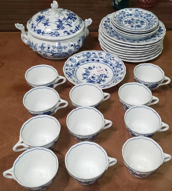 *GROUP OF BLUE AND WHITE DINNERWARE: Onion pattern, 8 dinner plates, 4 bread and butter plates, salad bowl, 11 cups, and covered tureen.