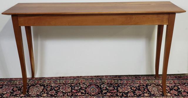 *CONTEMPORARY CONSOLE TABLE: Having rectangular top raised on sabre legs, approximate height 30", width 54", depth 15".