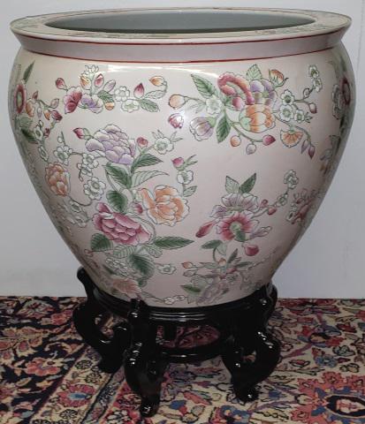 *CHINESE PORCELAIN JARDINIERE: Decorated with koi and other water life, raised on stand, approximate height 18".
