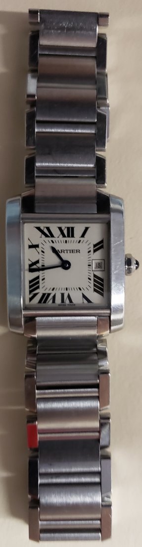 *CARTIER STAINLESS STEEL TANK FRANCAISE WATCH: Cartier stainless steel Tank Francaise bracelet watch, reference 2465, serial # 454602RX, silver dial with Roman numerals & inner minute track, date aperture at III, signature at VII. band marked swis