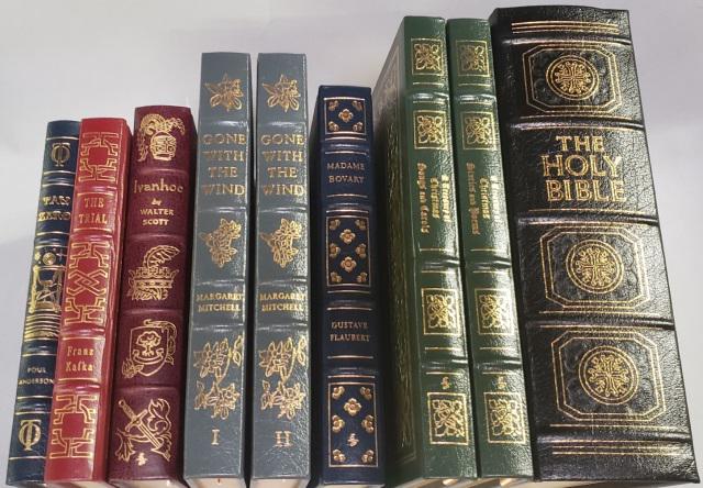 *10 BOOKS BY EASTON PRESS: "The Trial" by Franz Kafka, "Tau Zero" by Poul Anderson, "Du Maurier" by Peter Ibbetson, The Holy Bible, "A Treasury of Christmas Stories and Poems", "A Treasury of Christmas Songs and Carols", "Gone 