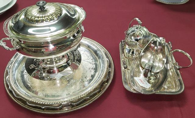 *9 PIECES OF SILVERPLATE: Period style creamer, covered casserole bowl, sauceboat with attached underdish, sugar bowl, tray with insert, 3 circular trays, and casserole bowl on heating stand.