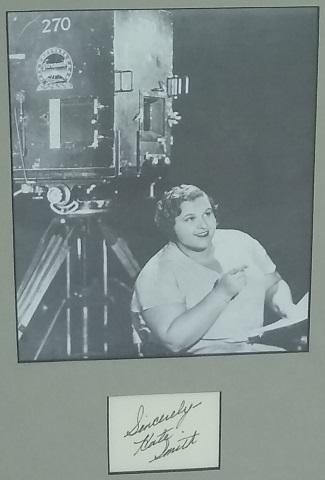 *KATE SMITH AUTOGRAPH: Professionally matted and framed b/w photo (6 1/2" x 8") and autograph (2 1/2" x2 1/8"). Total piece measures 10" x 15 3/4". Inscription, Sincerely - Kate Smith, Kathryn Elizabeth Smith, known profess