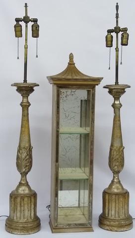 3 PIECES: Gilt-decorated composition table lamps, approximate height 41", and James Mont style wall mount curio cabinet, height 33".