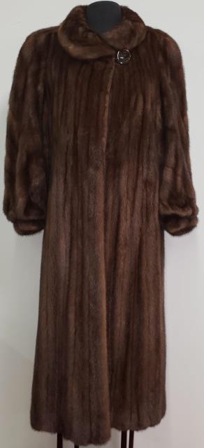 *FULL LENGTH FUR COAT: Light brown, with tags, Louis Feraud, Fourrure and N. H. Rosenthal Furs, Chicago. Provenance: Personal property from the estate of Uta DeTappan-Staley. (Approximate size 10).