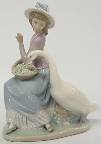 *LLADRO FIGURE: "Goose Trying to Eat", approximate height 9 1/2".