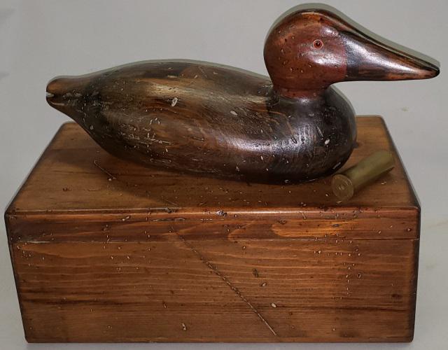 *THOMAS TABER CIGAR HUMIDOR: With duck decoy and shotgun shell on top, marked inside "Thomas Taber, American Decoy Co.", box and decoy intentionally distressed, approximate height 11 3/8", width 13 1/2", depth 7 1/2".