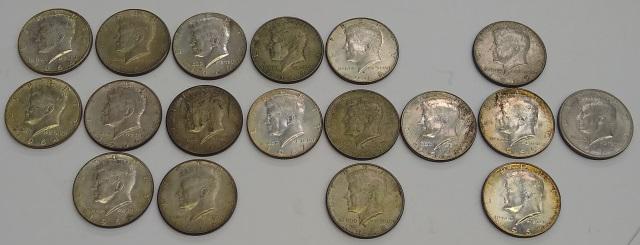 *18 U.S. KENNEDY HALF DOLLARS: 2 1964, 6 1966, 2 1967, 4 1968, 3 1969, and 1 1971.