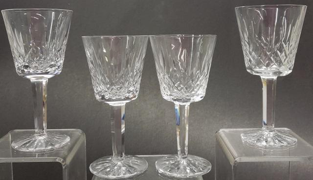 *11 WATERFORD GLASSES: Lismore pattern, white wine glasses, approximate height 5 7/8".