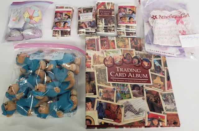 *GROUP OF AMERICAN GIRL ITEMS: Unopened trading cards, trading card album, 7 Bitty Baby bears, and 3 groups of Bitty Baby outfits and accessories.