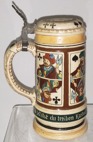 *GERMAN STEIN: Playing cards, numbered 1265, approximate height 8".