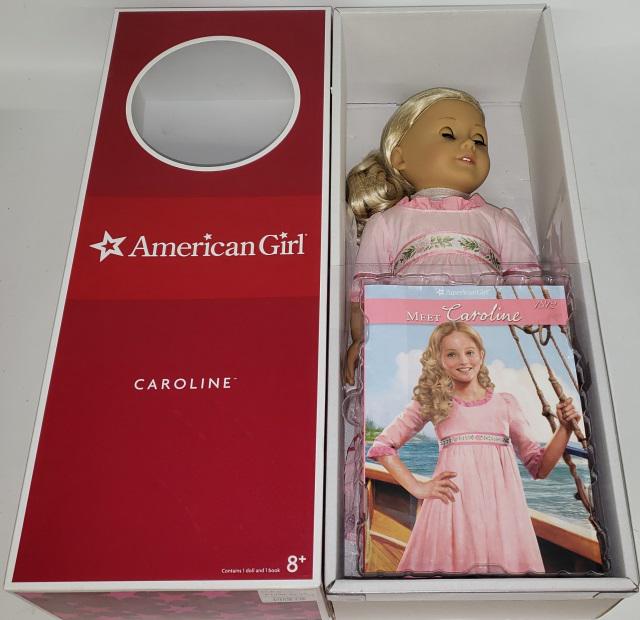 *AMERICAN GIRL DOLL: Caroline, with original box and book.