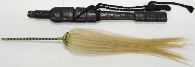 *2 PIECES OF AFRICAN ARTWORK: Dagger enclosed in sheath having ebony finish, approximate length 22 1/2", and horse hair fly swatter, length 30".