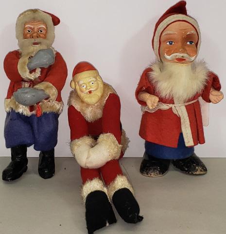 *3 VINTAGE SANTA CLAUS FIGURES: 2 composition with 1 marked "Made in Germany", and a tall Santa with celluloid head.