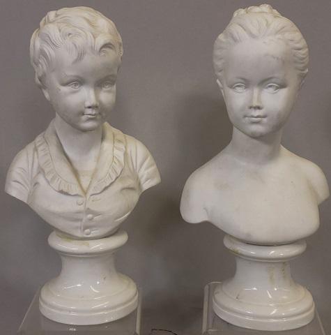 *PAIR OF PARIAN WARE BUSTS: Young boy and girl, approximate height 10".
