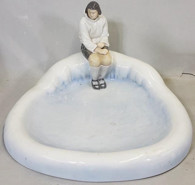 *BING & GRONDAHL PORCELAIN FIGURE: Seated girl at pond, no. 2253, approximate height 6 1/2", width 11", depth 12".