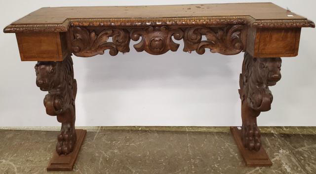 *CONSOLE TABLE: Having griffin-carved legs on each side, approximate height 25", width 41 1/2", depth 13 1/2".