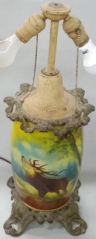 *BUFFALO POTTERY LAMP: Decorated with elk and landscape, approximate height 23 1/2".
